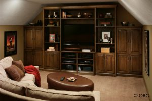 dark brown entertainment center with shelves and drawers