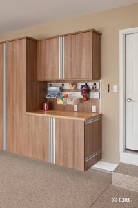 custom cabinetry with closets in garage