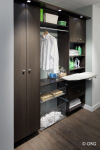 dark brown laundry room storage system