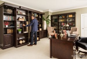 man using storage for murphy bed