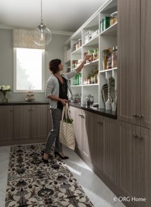custom pantry storage with woman browsing