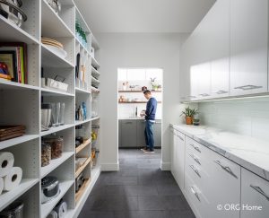 white pantry storage with person