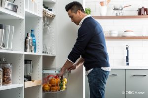 pull out pantry storage with man