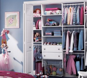 blue children's bedroom with white custom closet