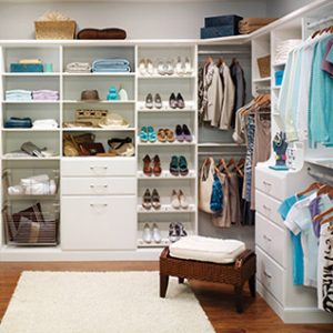 white shelves and cabinets for bedroom with shoe racks