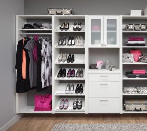 white shelves, coat racks and cabinets
